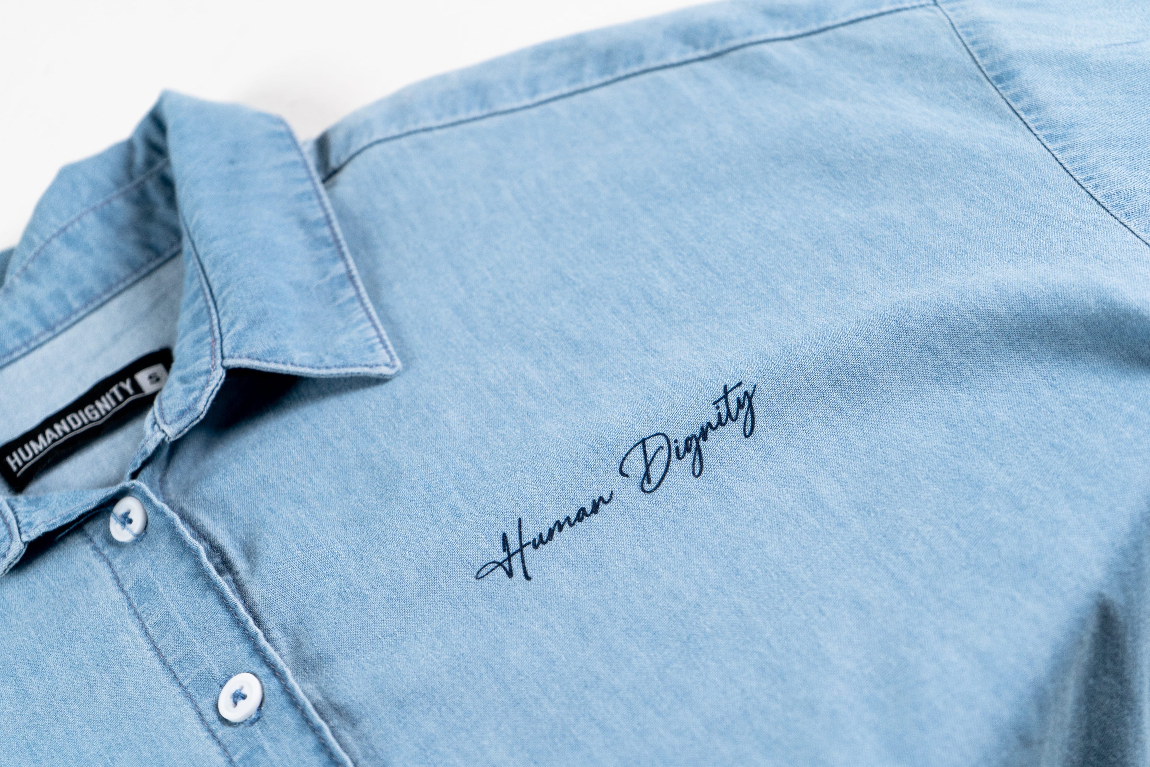 Camisa Crop Azul Bolsillos