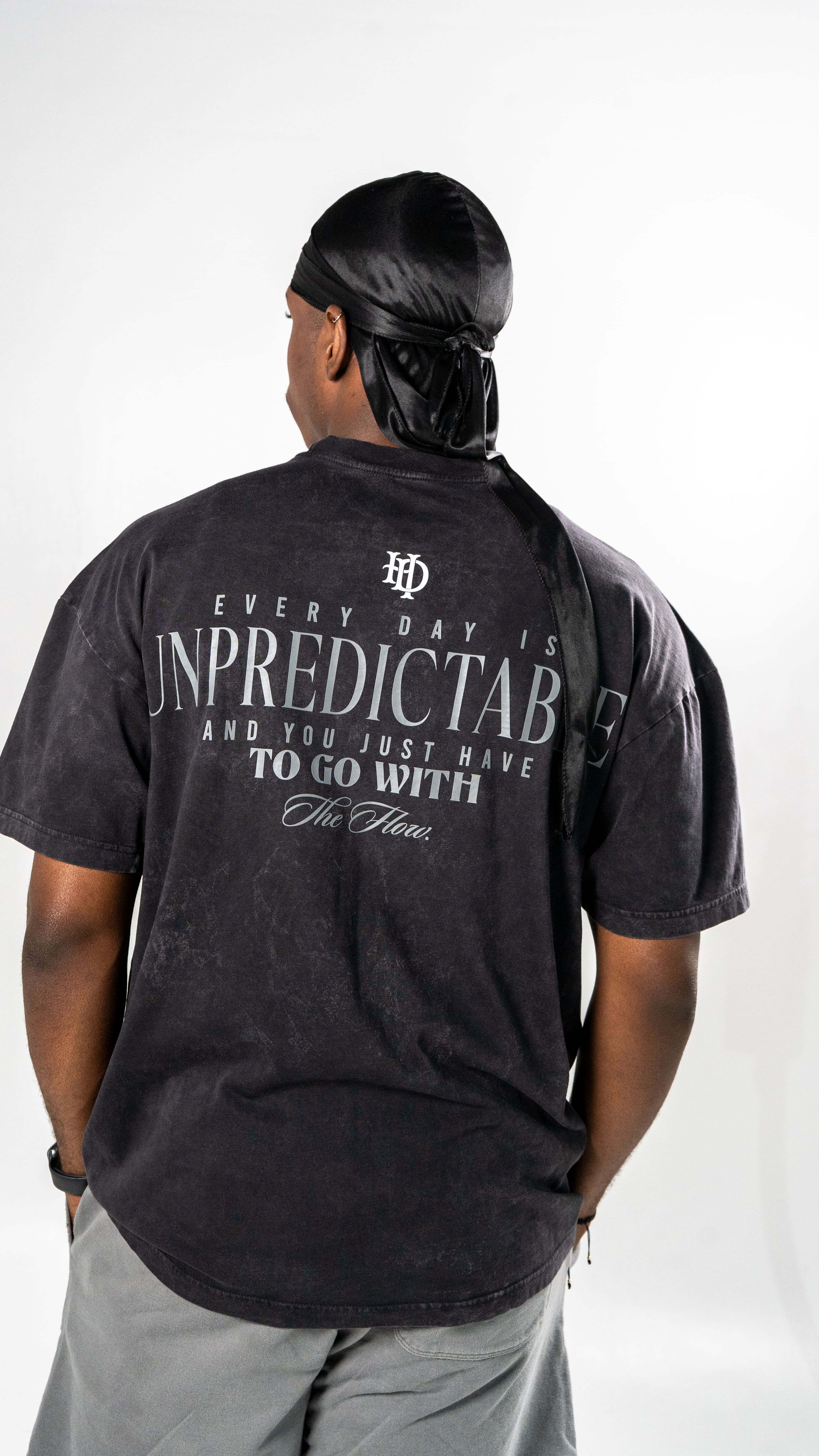 Camiseta Negra Unpredictable